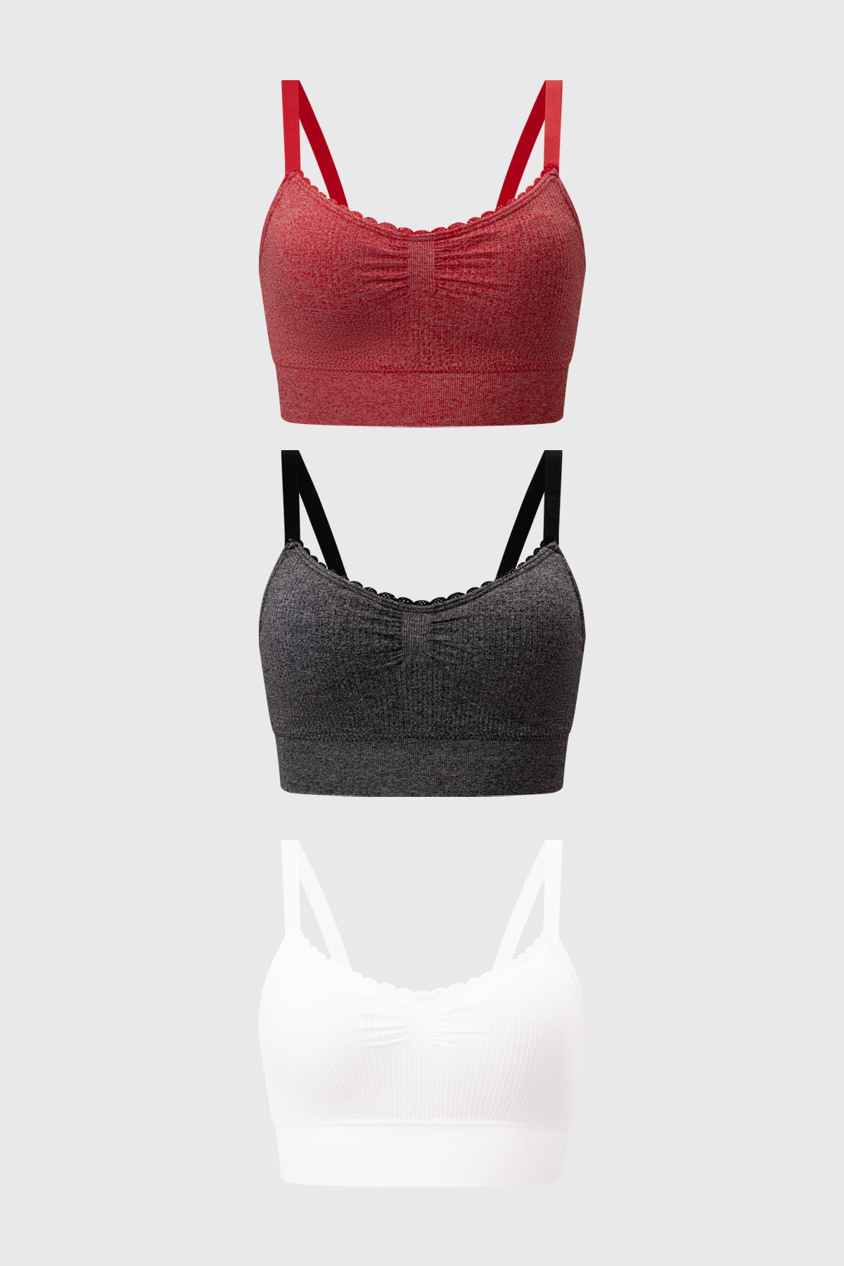 Tripack de sostenes juveniles en rojo negro y blanco con diseño recogido y detalles de encaje en la parte superior