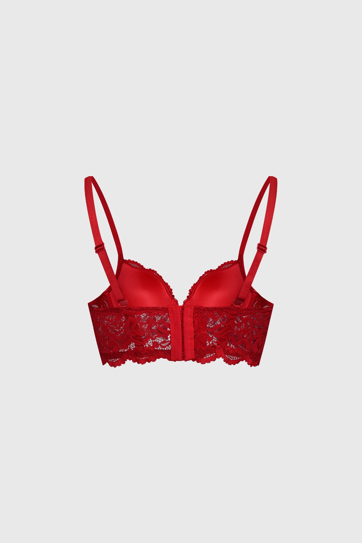 Sostén corset rojo con detalle de cruce en el centro y encaje floral cubriendo las copas y banda inferior lisa