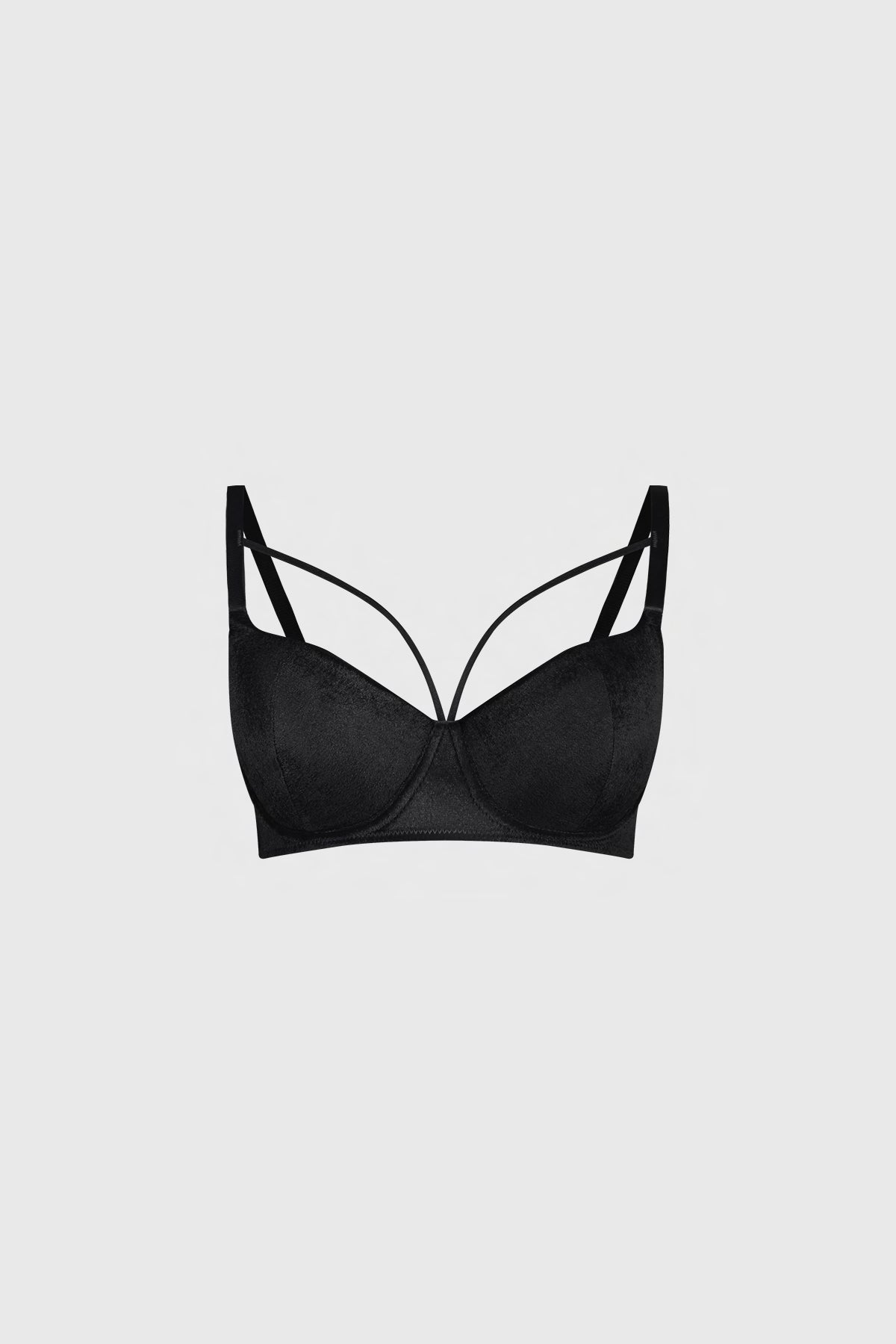Sostén negro copa soft con diseño liso y tirantes delgados estilo minimalista en centro y laterales
