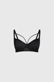 Sostén negro copa soft con diseño liso y tirantes delgados estilo minimalista en centro y laterales