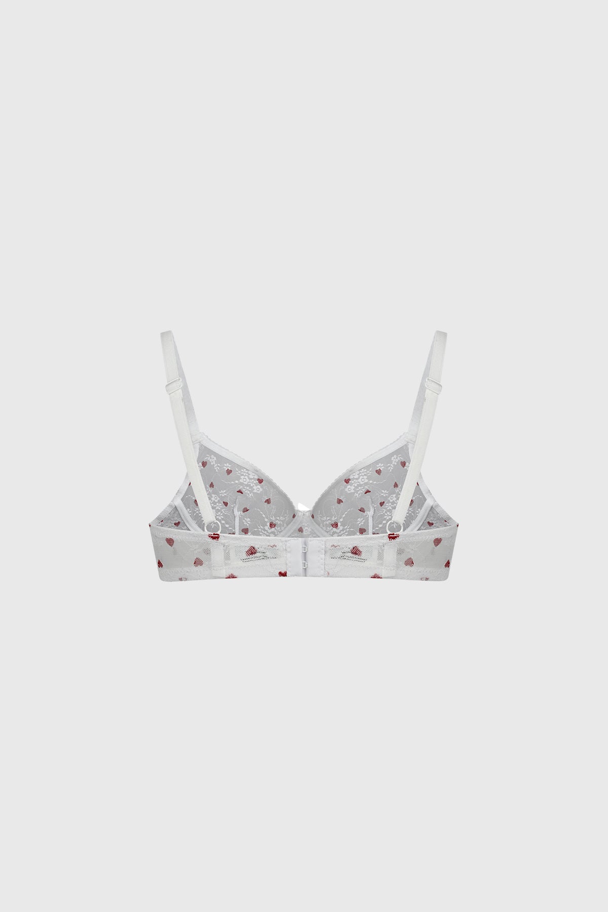 Sostén blanco con copas suaves estampado de corazones rojos pequeños por toda la prenda estilo romántico y delicado
