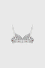 Sostén blanco con copas suaves estampado de corazones rojos pequeños por toda la prenda estilo romántico y delicado