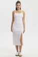 Vestido largo blanco con tirantes delgados y abertura lateral sin estampa lisa y elegante para un look veraniego