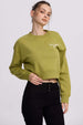 Polerón mujer crop verde claro con estampado
