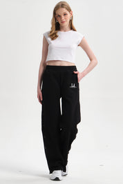 Pantalón Buzo Mujer Snaps Negro