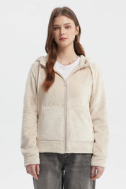 Polar de mujer abierto beige claro con capucha y bolsillos frontales estilo casual sin estampa visible