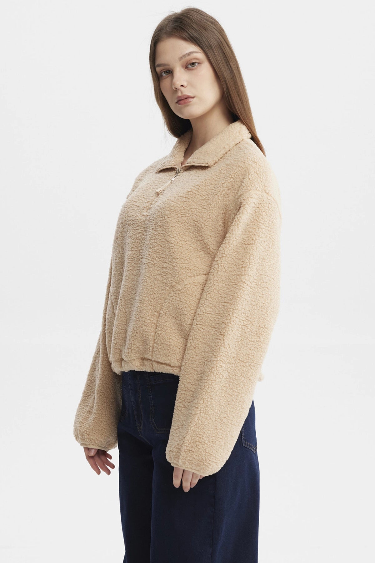 Polar mujer beige con textura corderito y medio cierre sin estampa lisa ideal para el invierno