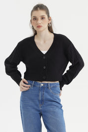 Sweater negro de mujer con diseño juvenil de punto grueso sin estampa ideal para días fríos y casuales