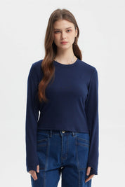 Polera azul para mujer de manga larga con abertura en el puño diseño liso y ajuste ceñido ideal para un look casual