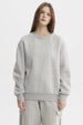 Polerón mujer liso gris melange claro de corte relajado y cuello redondo sin estampa ideal para días casuales