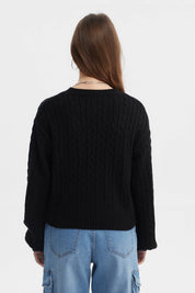 Sweater negro tejido juvenil para mujer con diseño de trenzas verticales sin estampa visible