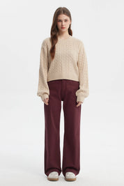 Sweater tejido juvenil beige con diseño de trenzas en toda la prenda sin estampa visible