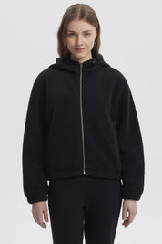 Polar mujer negro con capucha cremallera frontal y diseño liso ideal para el invierno
