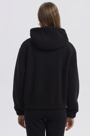 Polar mujer negro con capucha cremallera frontal y diseño liso ideal para el invierno