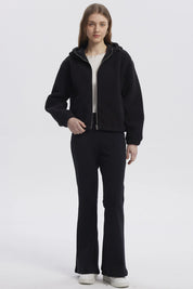 Polar mujer negro con capucha cremallera frontal y diseño liso ideal para el invierno