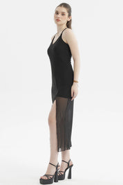 Vestido largo negro de pabilo con falda transparente y abertura central sin estampa