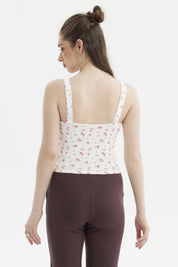 Polera mujer crudo con escote corazón y recogido estampada con flores pequeñas rosas por todo el frente estilo casual