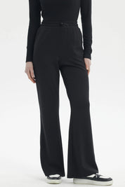 Pantalón buzo mujer slim negro con ajuste en cintura y diseño liso ideal para estilo casual y comodidad diaria