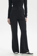 Pantalón buzo mujer slim negro con ajuste en cintura y diseño liso ideal para estilo casual y comodidad diaria