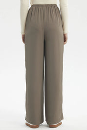 Pantalón mujer holgado verde militar claro con cordón ajustable en la cintura prenda lisa estilo relajado y versátil