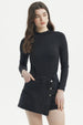 Polera mujer ajustada negra lisa de manga larga ideal para combinar con faldas o jeans para un look casual elegante
