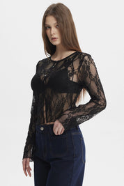 Polera negra de mujer con encaje floral y botones al frente de estilo elegante y manga larga sin estampa lisa