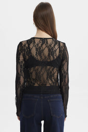 Polera negra de mujer con encaje floral y botones al frente de estilo elegante y manga larga sin estampa lisa