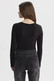Polera mujer body negro lisa de manga larga y cuello redondo ajustada al cuerpo