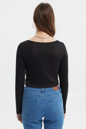 Polera negra ajustada para mujer con botones frontales y manga larga sin estampa lisa elegante y versátil