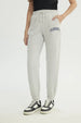 Pantalón Buzo Mujer Pitillo Gris Melange