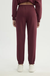 Pantalón Buzo Mujer Pitillo Burdeo