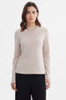 Polera mujer rib lisa beige manga larga cuello redondo sin estampa ideal para looks casuales y elegantes