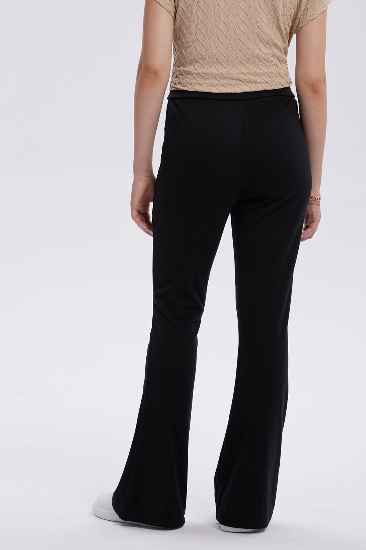 Calza Mujer Flare Piping Delantero Negro