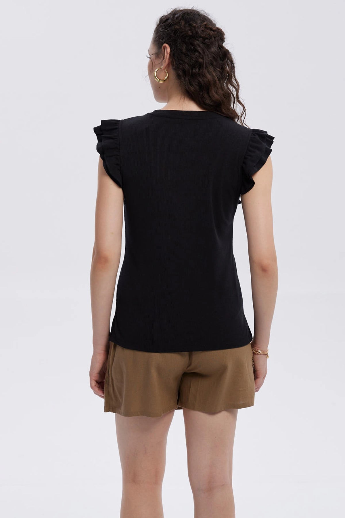 Polera Mujer Vuelos Rib Lisa Negro