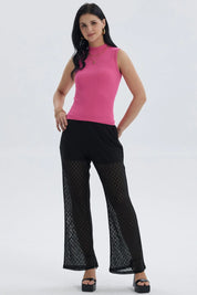 Pantalón flare negro con short y patrón zigzag transparente