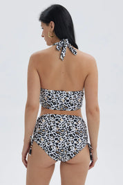 Traje de baño mujer blanco con estampado de leopardo y escote en V