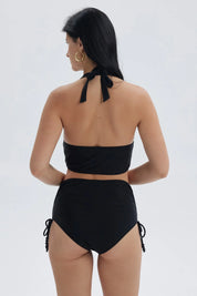 Traje de baño negro de mujer con peto y escote en V