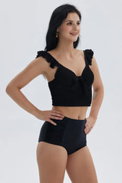Traje de baño negro con top de vuelos y textura para mujer