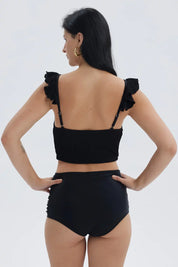 Traje de baño negro con top de vuelos y textura para mujer