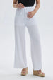Pantalón blanco mujer con textura y pretina con amarras visible