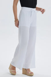 Pantalón blanco mujer con textura y pretina con amarras visible