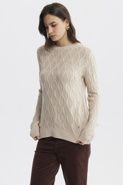 Sweater beige de mujer con diseño de tejido ondulado sin estampa visible ideal para un look casual y acogedor