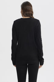 Sweater mujer negro con diseño de ondas en relieve estilo casual sin estampa visible