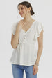 Polera mujer negra con botones en el frente prenda lisa ideal para un look casual y moderno