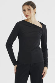 Polera asimétrica negra para mujer de manga larga sin estampa diseño liso elegante y moderno