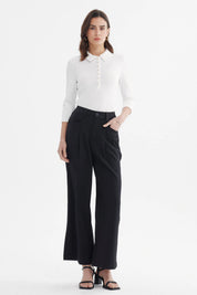 Pantalón sastrero negro para mujer con pretina de botón diseño liso ideal para un look elegante y sofisticado