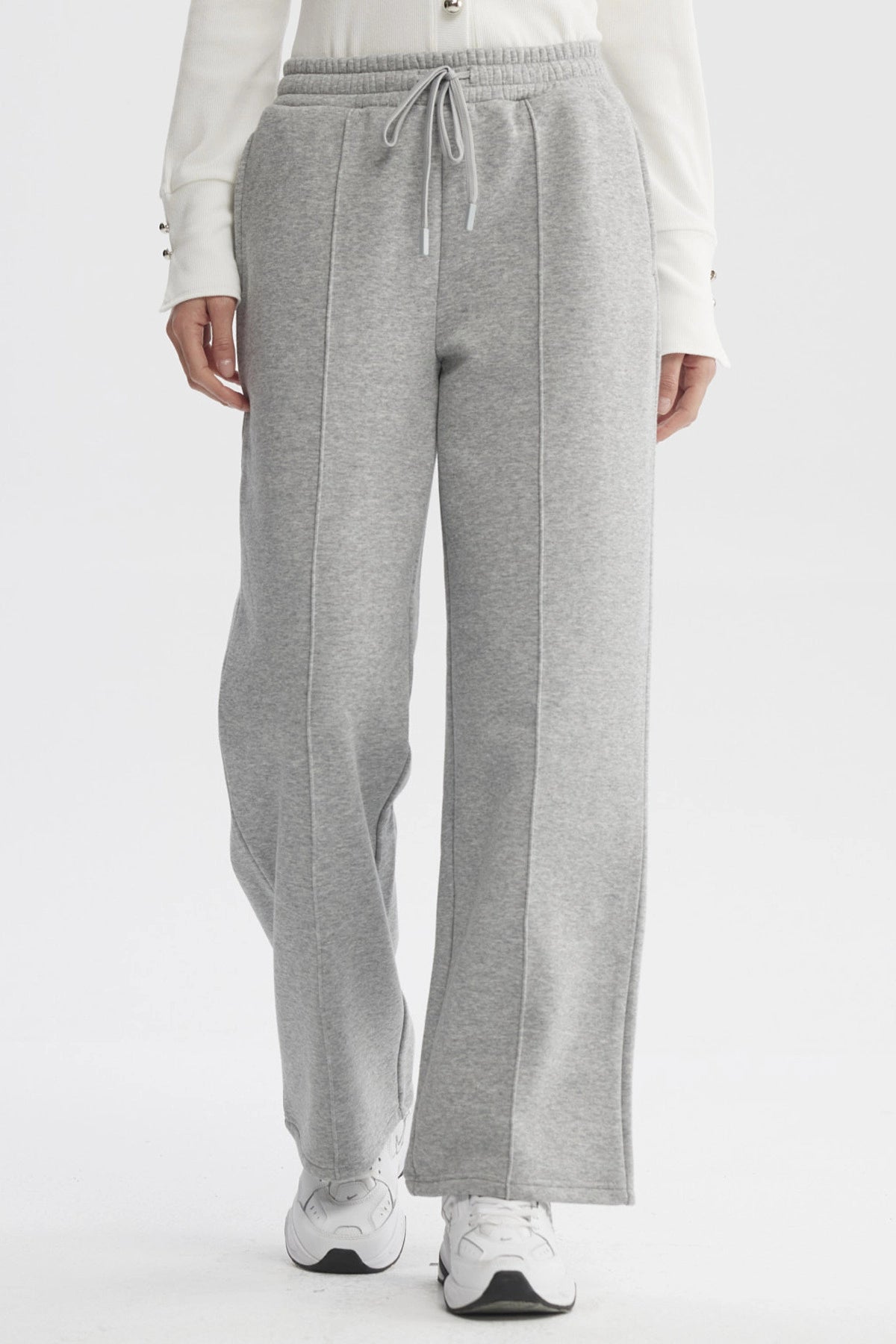 Pantalón de buzo mujer gris melange con diseño liso y pierna ancha para un estilo cómodo y relajado