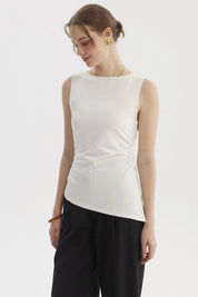 Polera mujer crudo sin mangas basta asimétrica diseño liso ajuste suave y cómodo ideal para un look casual elegante