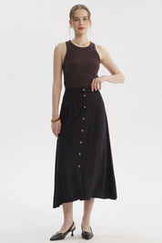 Falda midi negra con botones frontales dorados prenda lisa elegante para un look casual y sofisticado