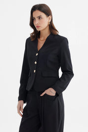 Blazer negro de mujer con botones dorados y bolsillos delanteros estilo formal elegante sin estampa lisa